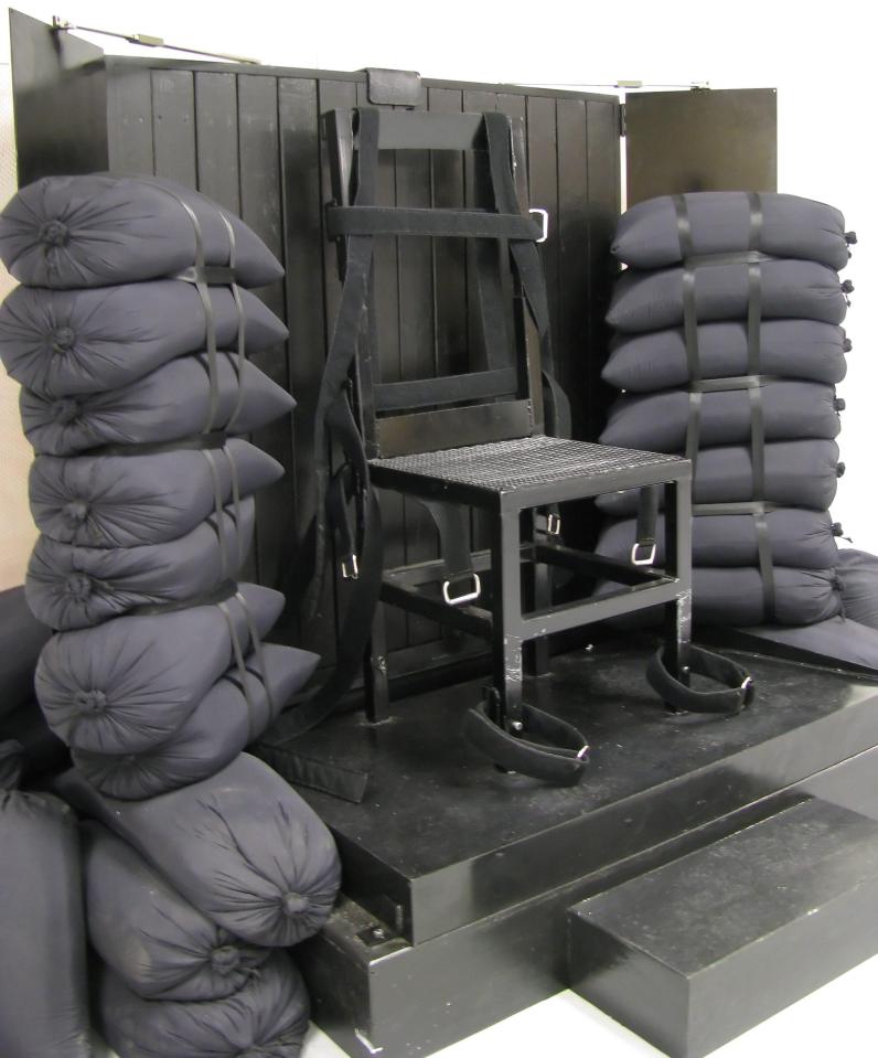  Sandbags surround the black chair in which Ronnie Lee Gardner was shot by firing squad in Utah in 2010