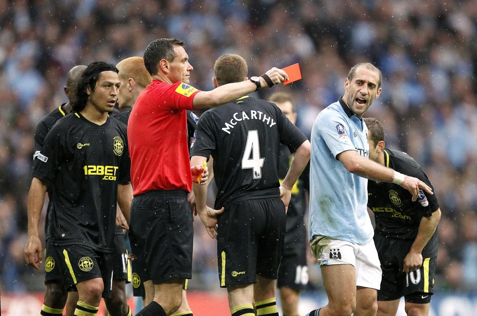  Marriner gives Pablo Zabaleta his marching orders in the 2013 FA Cup final