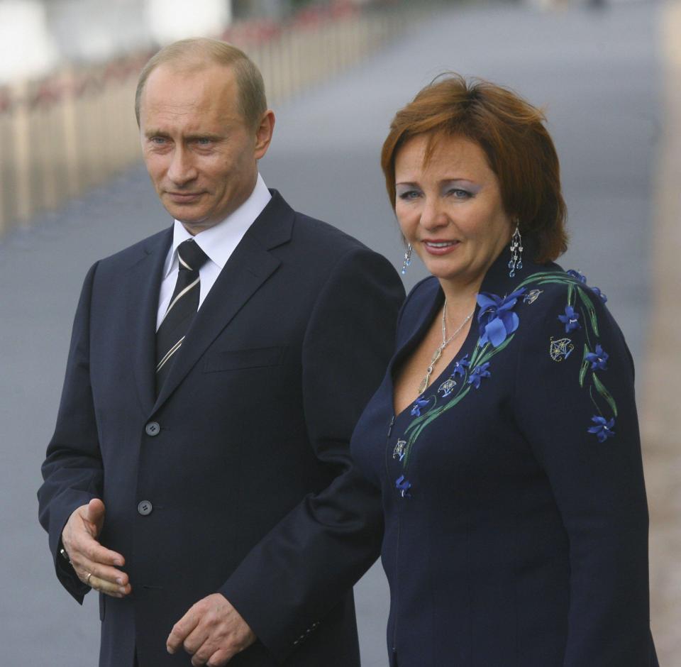  Putin pictured with his ex-wife Lyudmila who he divorced in 2014