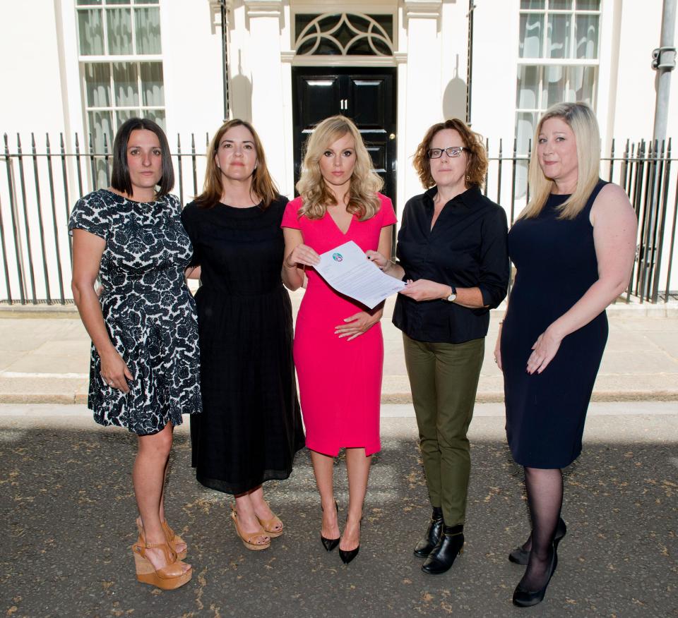  Michelle delivering a domestic violence petition to No. 11 Downing Street on behalf of the Give Me Shelter Campaign