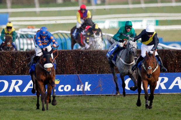 Sam Twiston-Davies (left) riding Vicente winner of the Coral Scottish Grand National