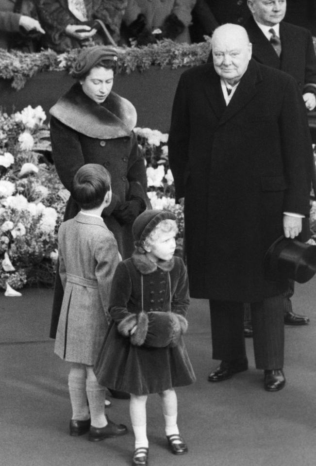  The Queen, Prince Charles and Princess Anne with Prime Minister Winston Churchill in 1954