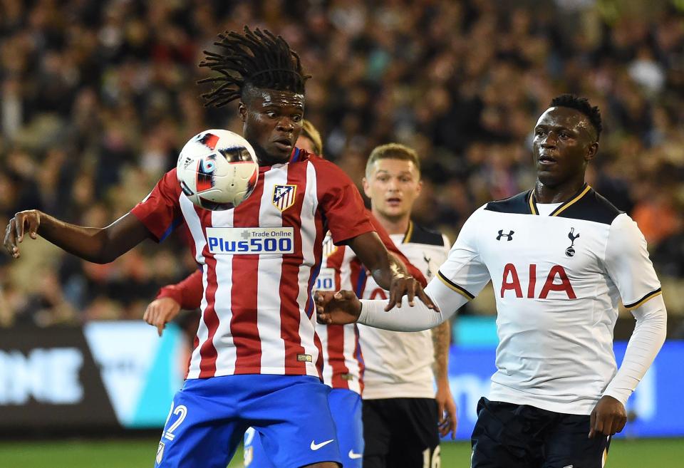  Partey (left) takes on Tottenham in pre-season