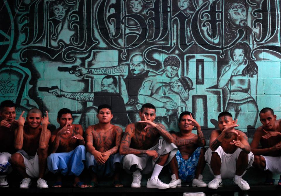  18th Street Gang members pose at a prison in Quezaltepeque, on the outskirts of San Salvador, in 2012