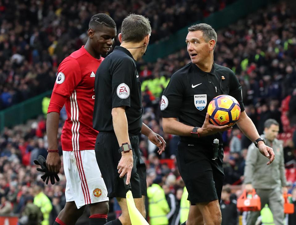  Marriner in discussions with United midfielder Paul Pogba earlier this season