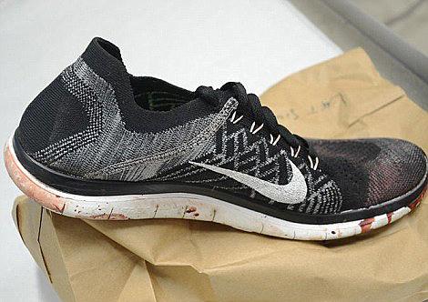 A bloody Nike trainer found near the murder scene