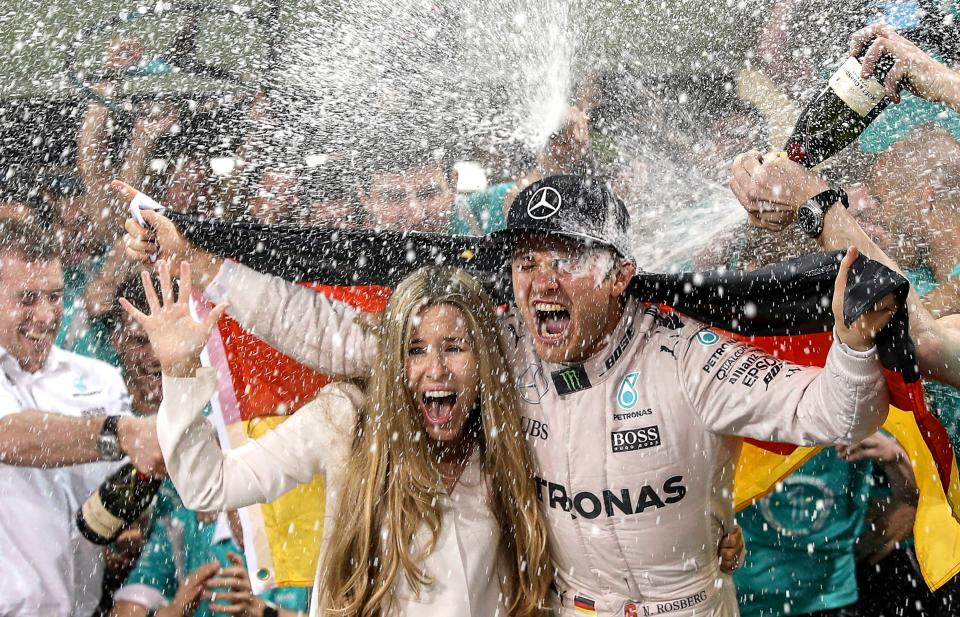  Rosberg celebrating his world championship triumph after finishing the previous two years in second place