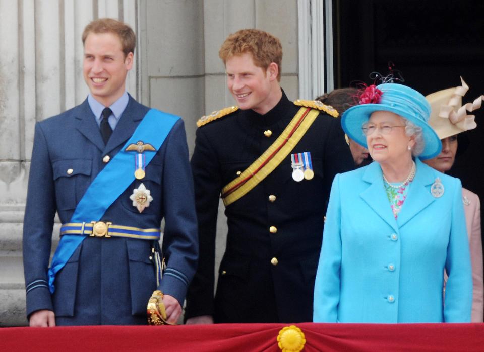  Prince William, Harry and the Queen watch a fly past from the balcony of Buckingham Palace