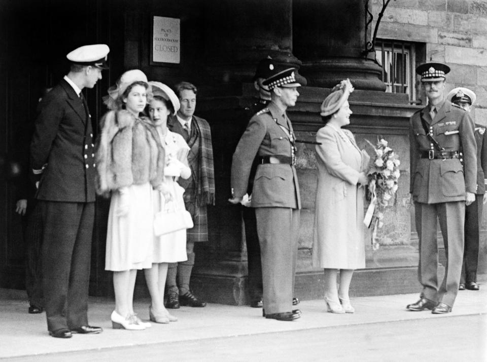  King George VI and the Queen, with the Princess Elizabeth and Princess Margaret, on arrival at Holyrood