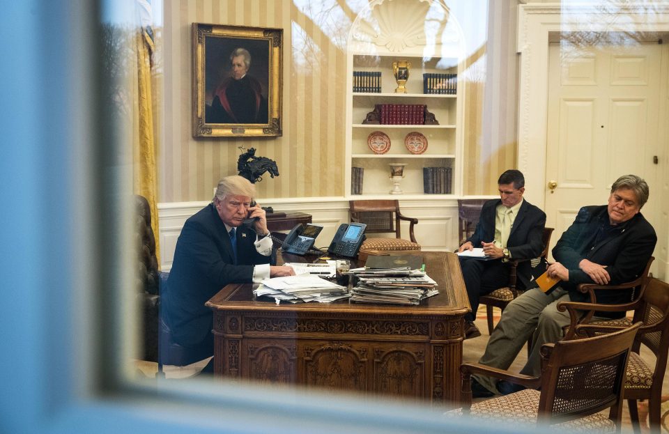  Military veteran Flynn, centre, sat in on a number of key phone calls with the President