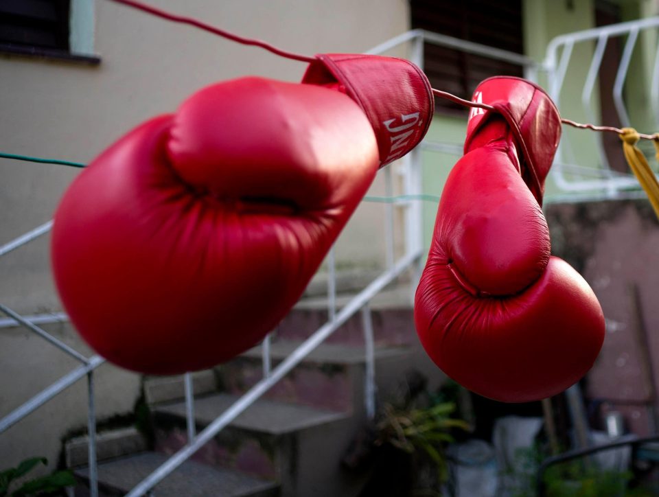  Idanerys Moreno's boxing gloves hang on a line to dry