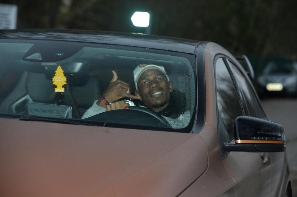  Paul Pogba unleashed cheeky gesture to photographers at Carrington