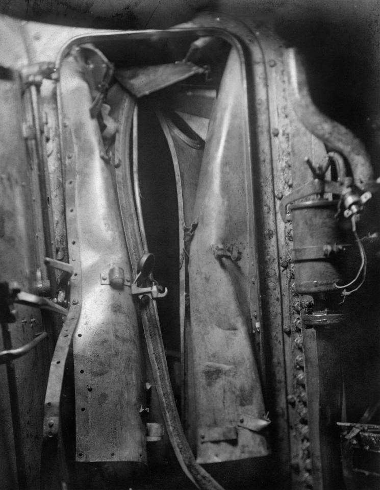  The damaged interior of a submarine is seen after it became stranded on the British coast