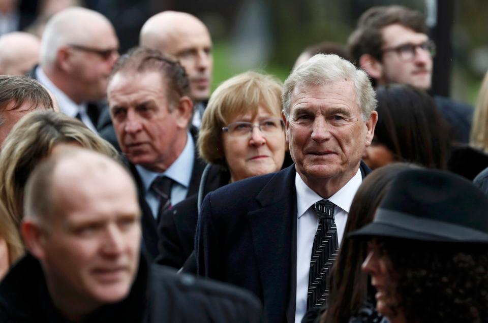  Former FA chief Sir Trevor Brooking walks ahead of ex-Watford striker Gerry Armstrong