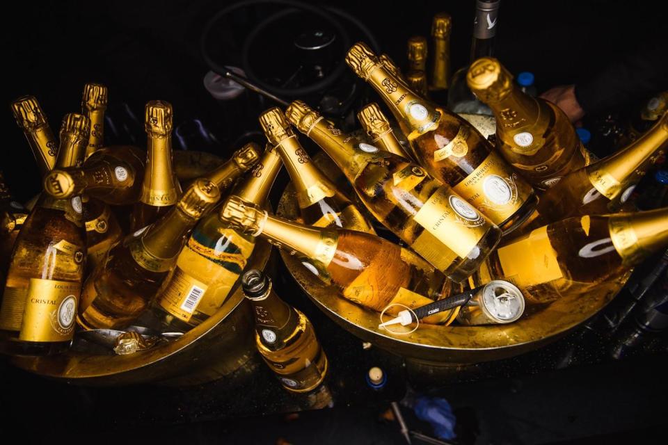  The boys were also treated to plenty of posh Champagne at the exclusive A-list haunt