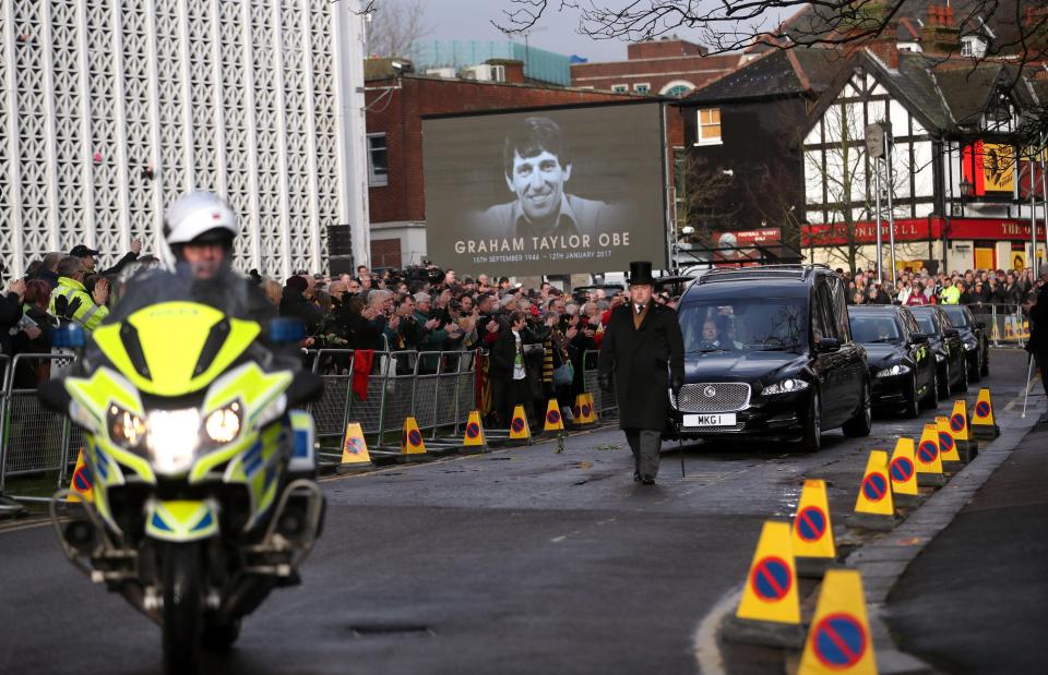  Hundreds of fans lined the streets as the hearse made its way through Watford