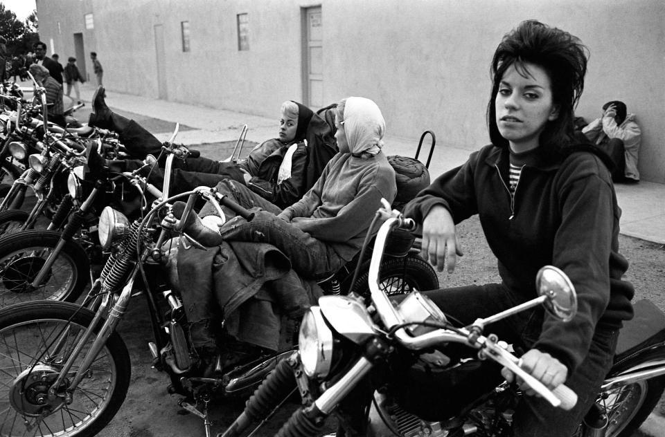  Some of the 'old ladies' sit on their men's bikes