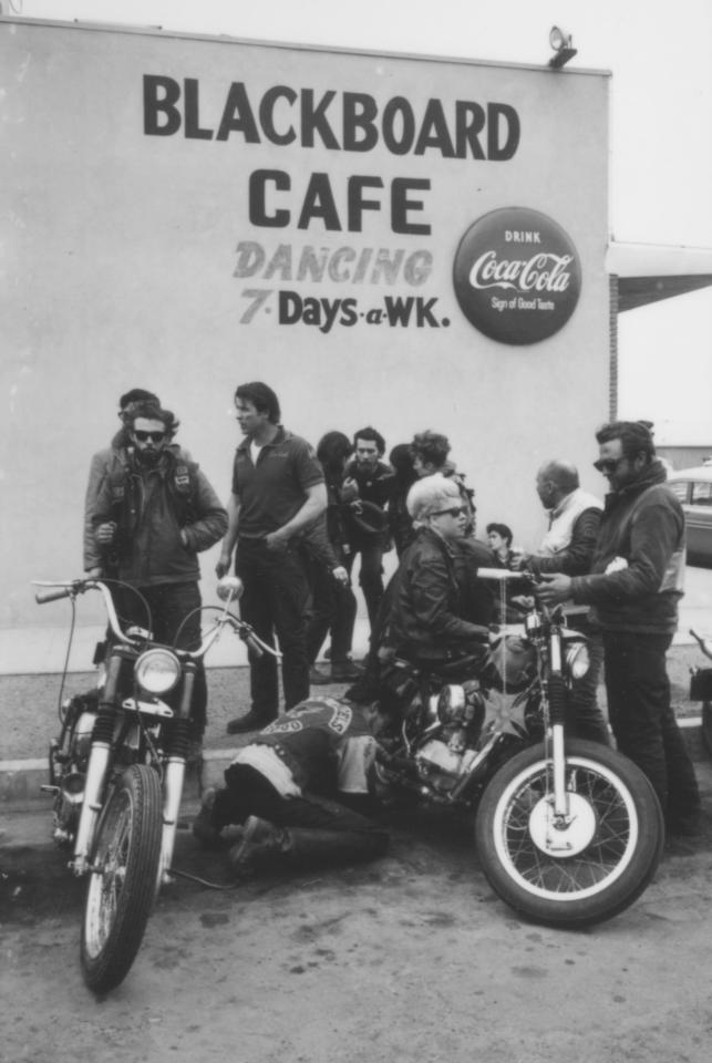  The bikers gather outside the Blackboard Cafe where they bedded down in Bakersfield