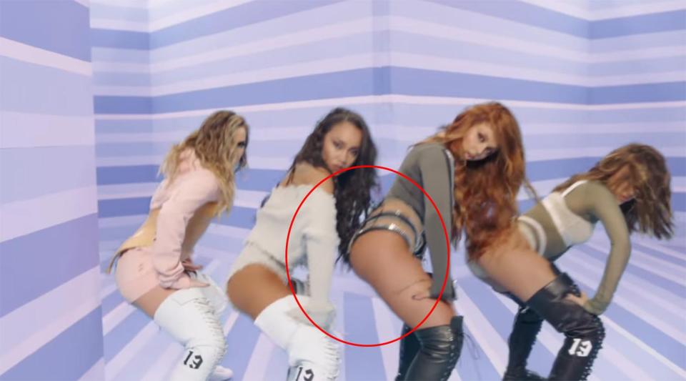  The reason it looked like Jesy was the only one that had beeen 'photoshopped' was simply down to the fact she was in the middle of the other girls - placing her directly in front of the angled wall