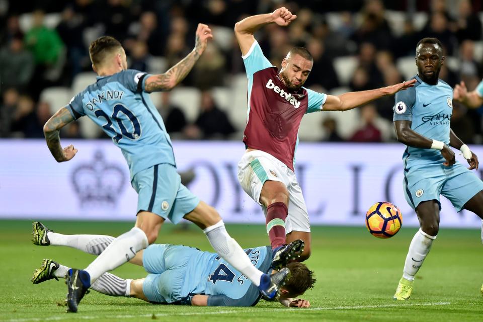  John Stones feels the force of Winston Reid's studs on his head