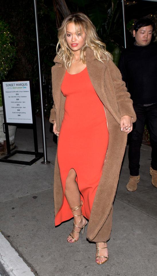  Rita Ora left the Giorgio Baldi Italian restaurant in LA in this vivid orange number ahead of the Fifty Shades Darker premiere yesterday