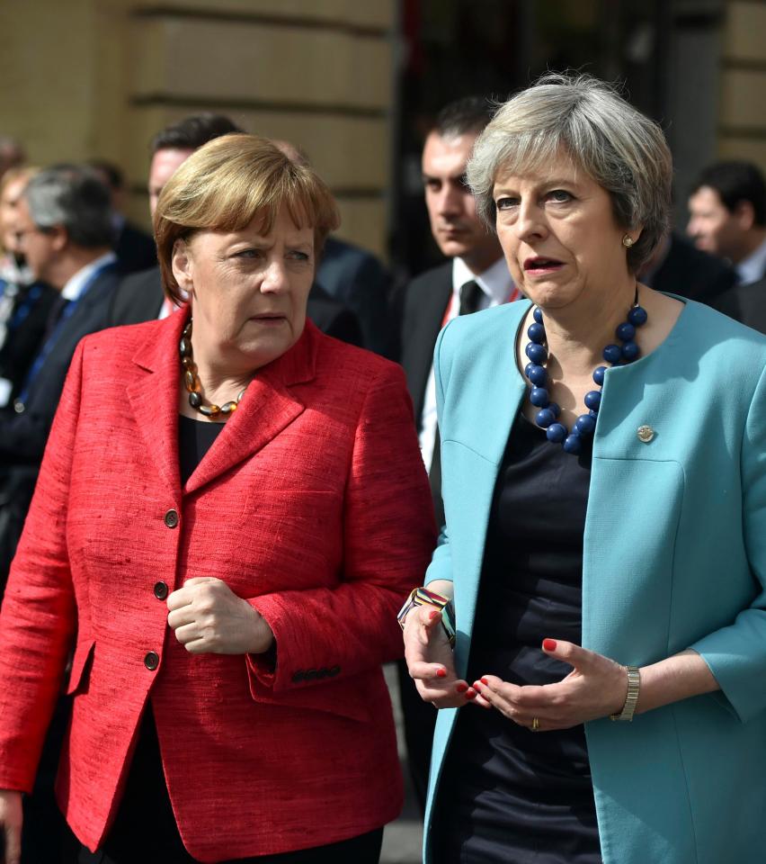  Merkel and May chat during a walk through Valletta - but the subject of Donald Trump was avoided