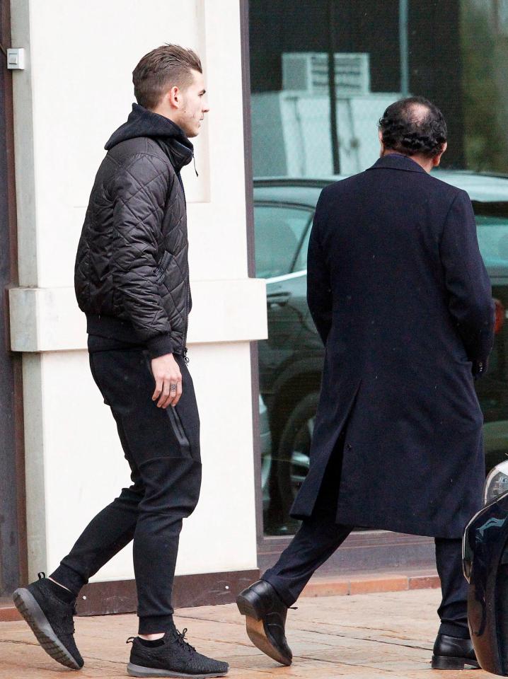  Atletico Madrid defender Lucas Hernandez is pictured leaving Majadahonda court on Friday after being arrested on a domestic abuse charge