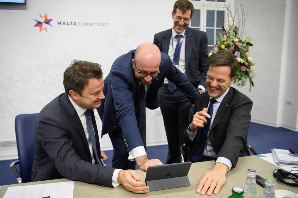  Prime Ministers of Luxembourg Xavier Bettel, Belgium Charles Michel and the Netherlands Mark Rutte laugh as they watch a satirical TV sketch show