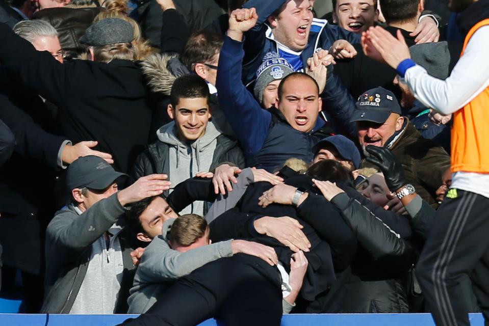  Antonio Conte celebrating with the fans after Eden Hazard's superb solo goal against Arsenal last week