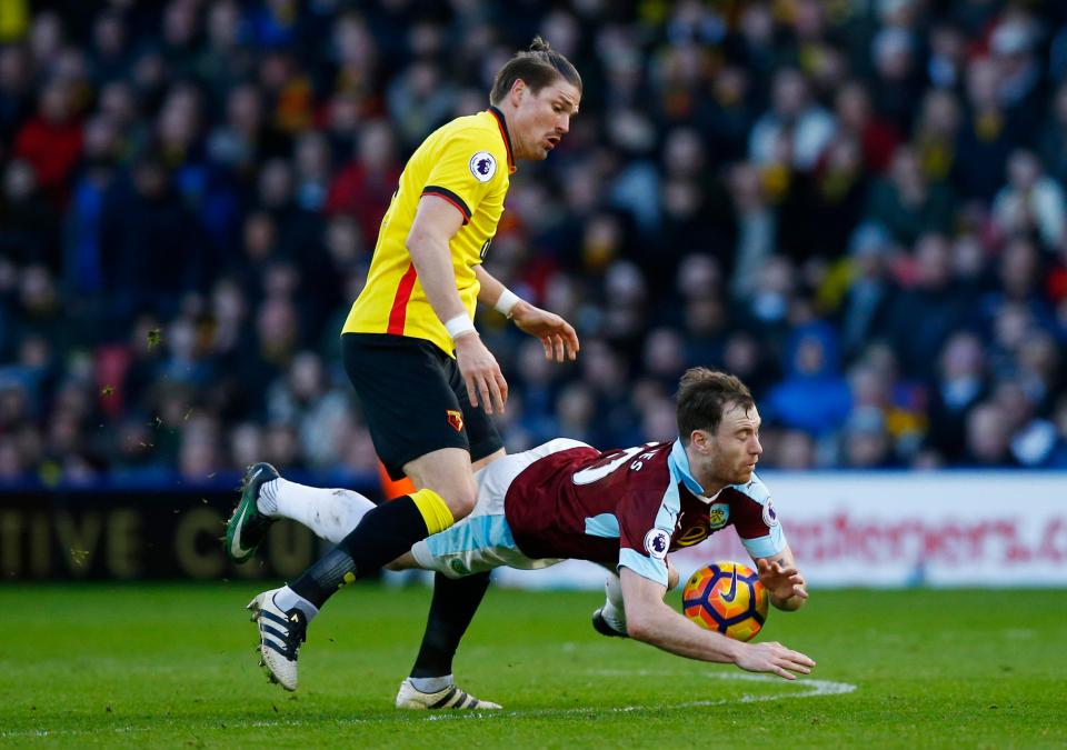  Ashley Barnes was denied a penalty after a challenge from Sebastian Prodl