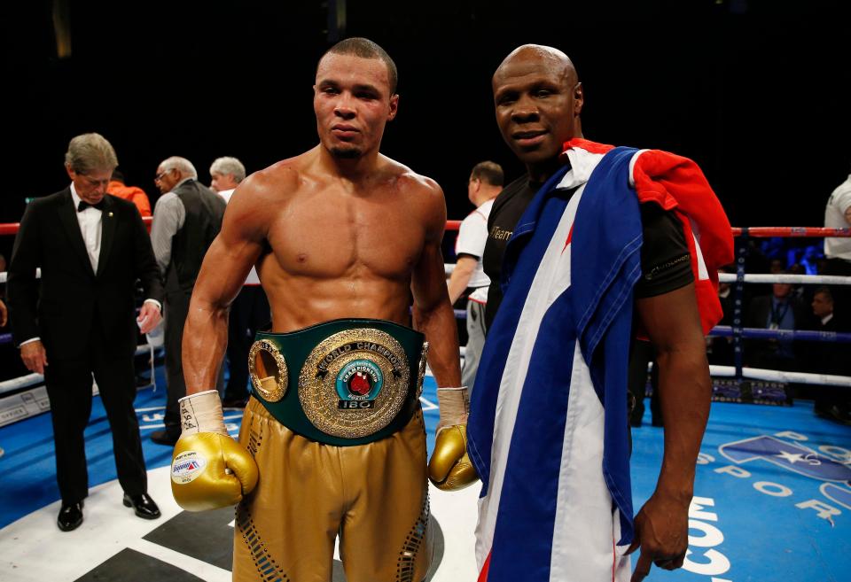  Eubank Jnr celebrates with his dad, Chris Eubank Snr (right)