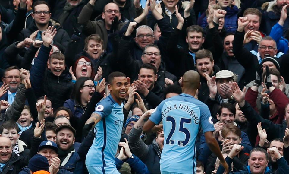  The Brazilian duo celebrate the first of Jesus' double against Swansea