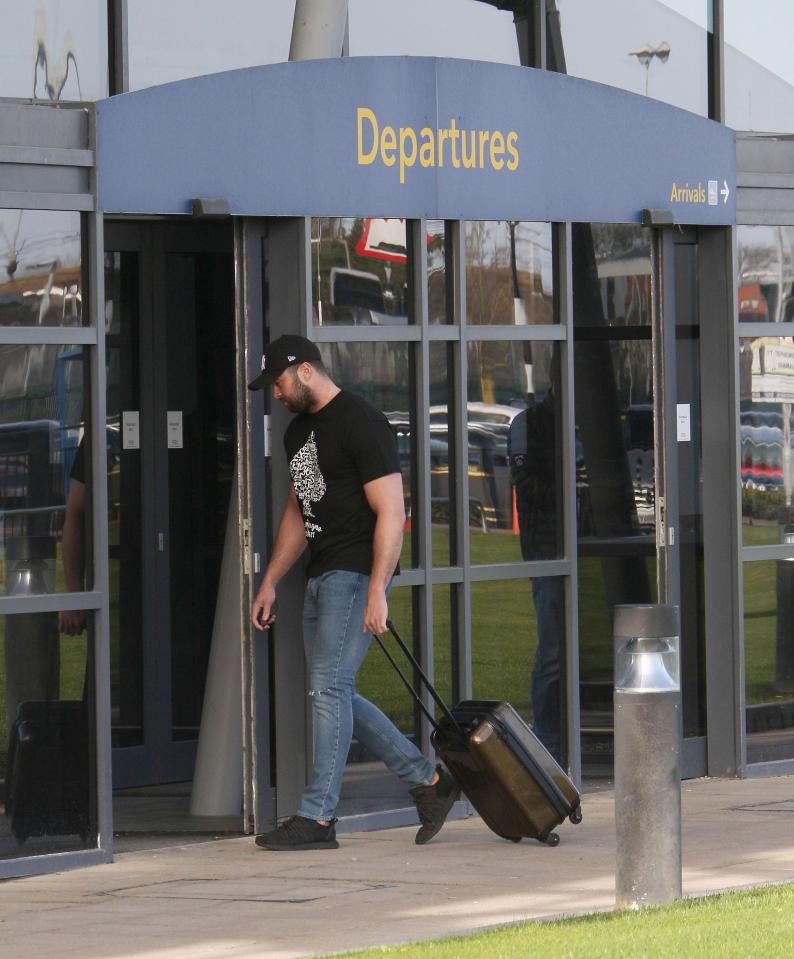  He was seen entering the departure lounge with a suitcase