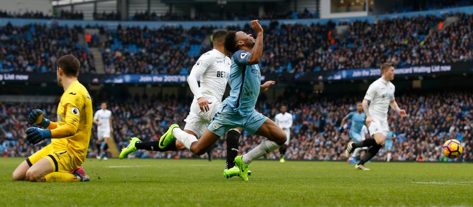  Sterling sunk to the floor but Mike Dean saw it as a dive