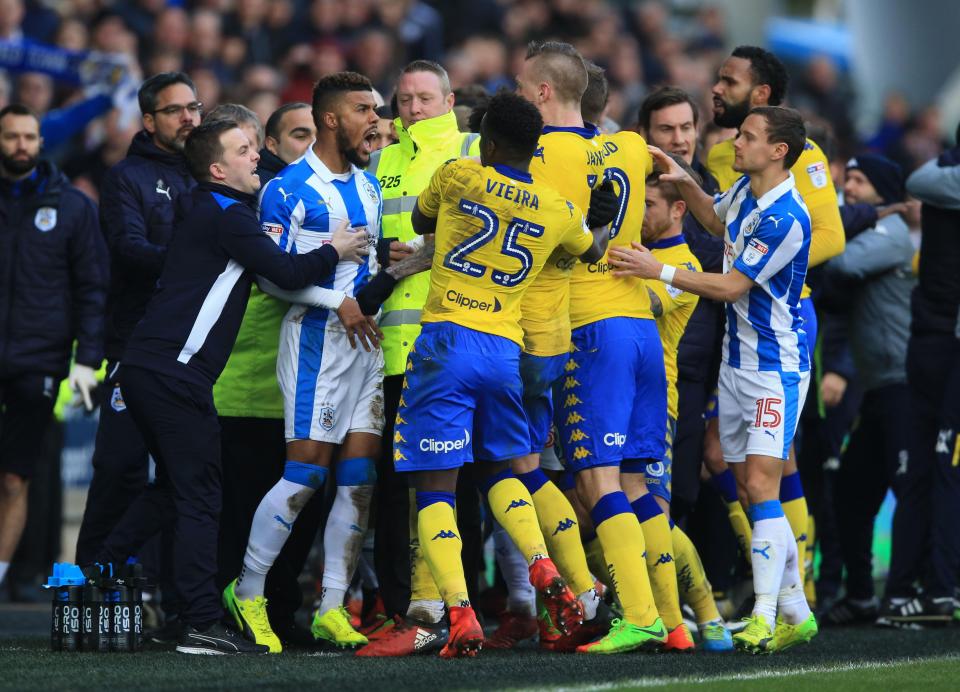  Leeds midfielder Ronaldo Vieira tried separating the players