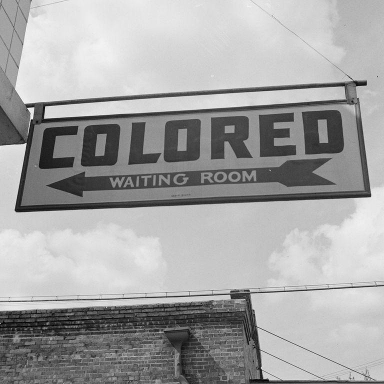  A sign serves as a stark reminder that waiting rooms were still segregated depending on the colour of a passenger's skin