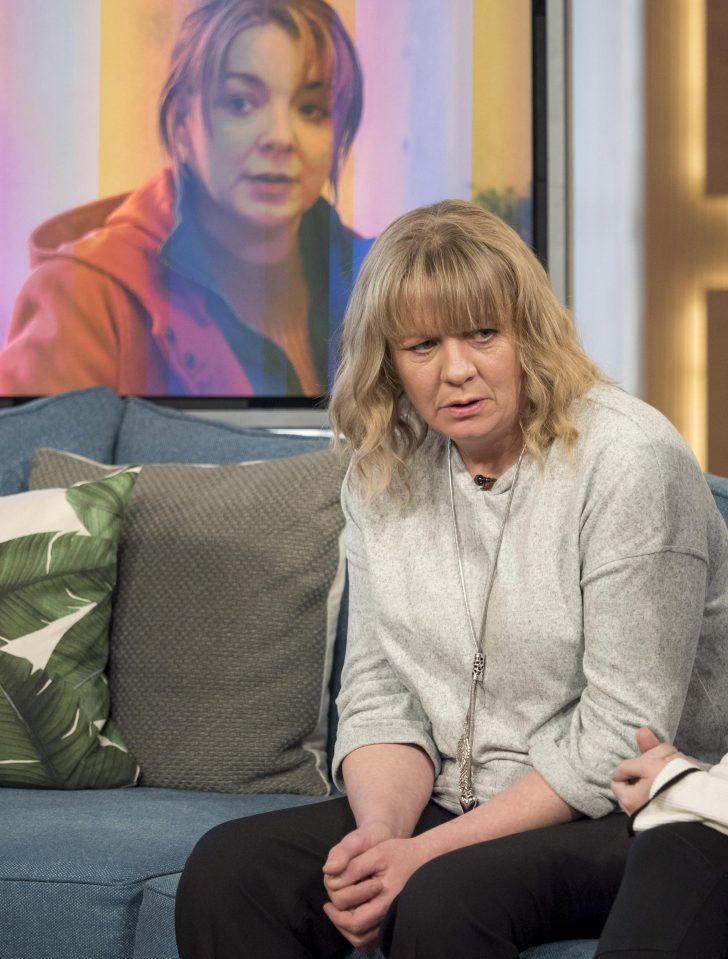  Julie speaking on TV about her theory, with a picture of Sheridan Smith, who plays her in the drama, behind her