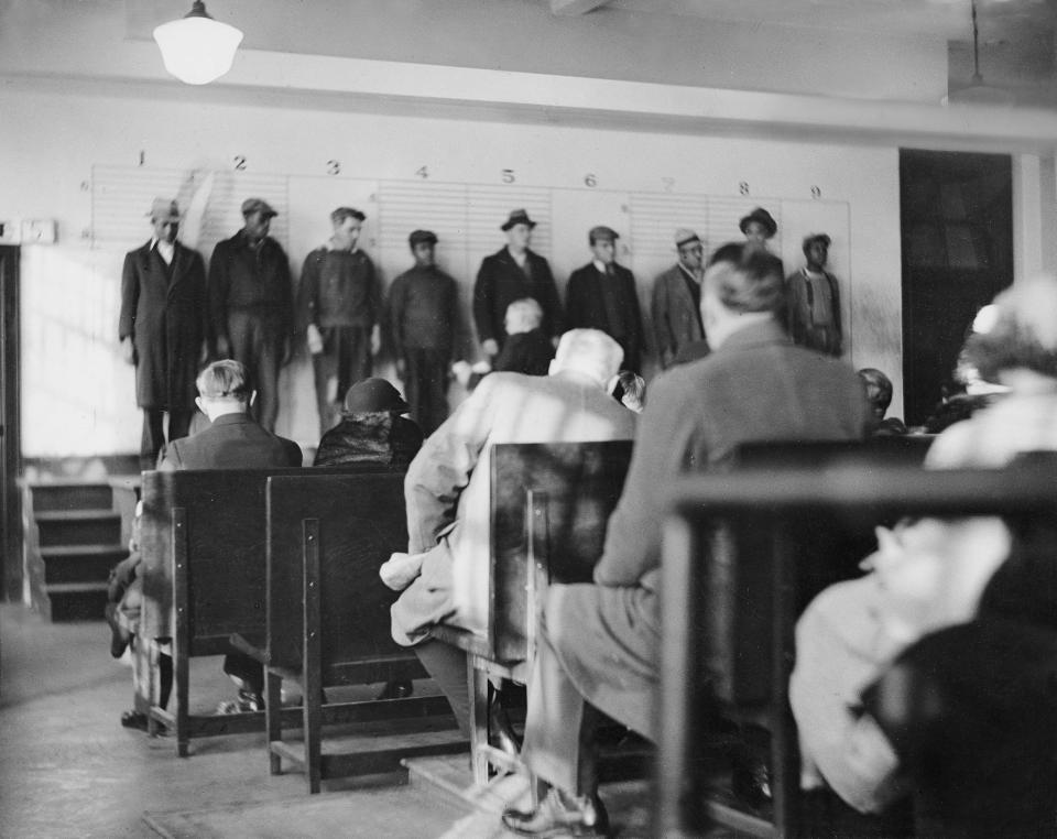  Criminals caught during the summer of 1934 are lined up and put on public parade in Chicago