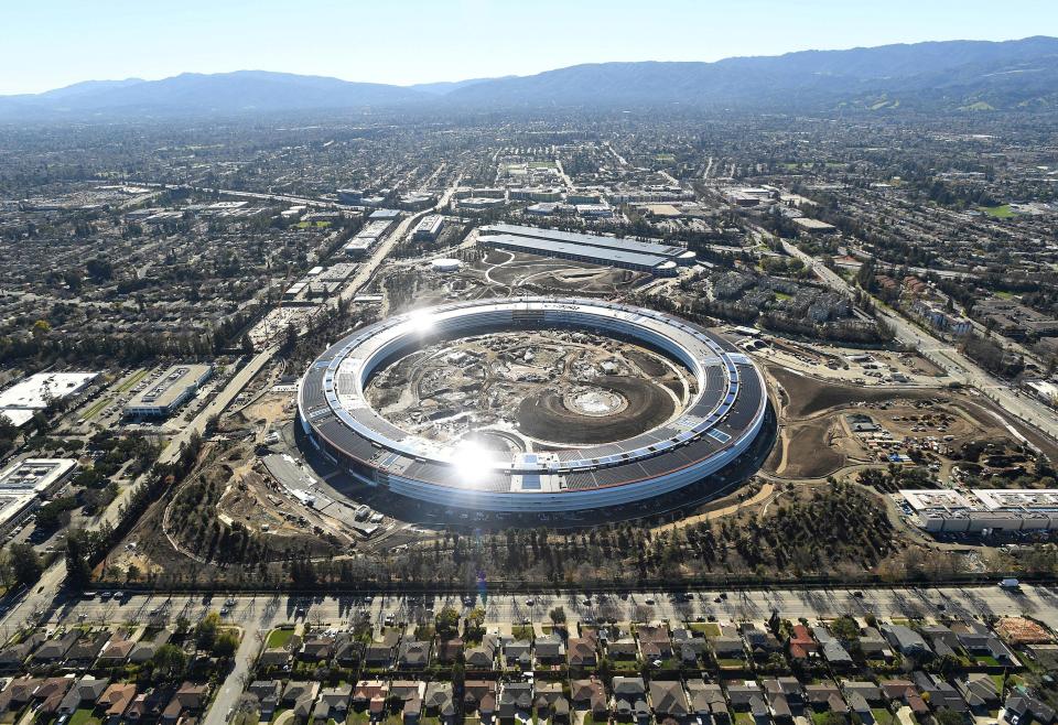  The massive circular building dwarfs everything around it