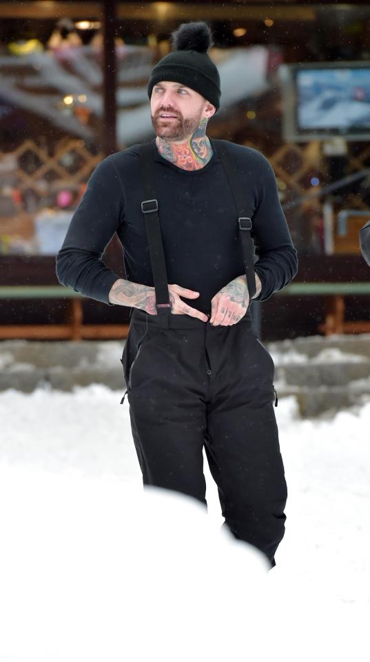  Newly single Aaron Chalmers was kitted out for the cold weather