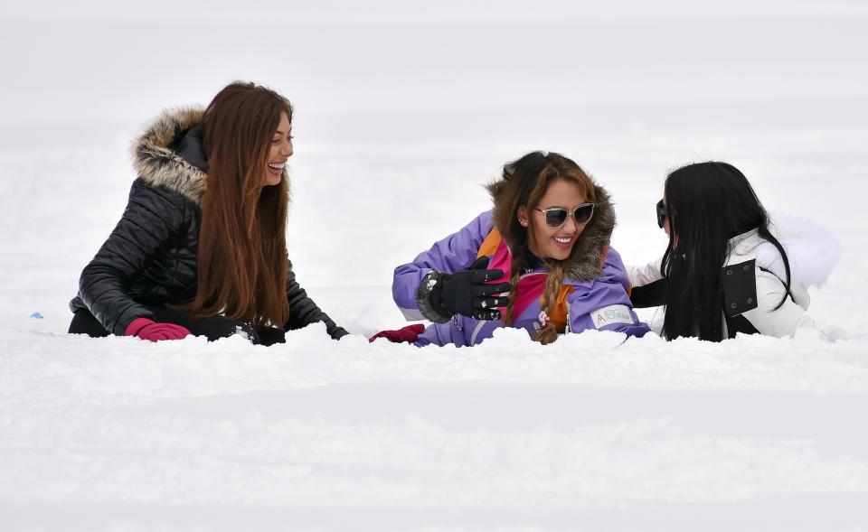  Chloe Ferry, Sophie Kasaei and Marnie Simpson all collapsed laughing the snow