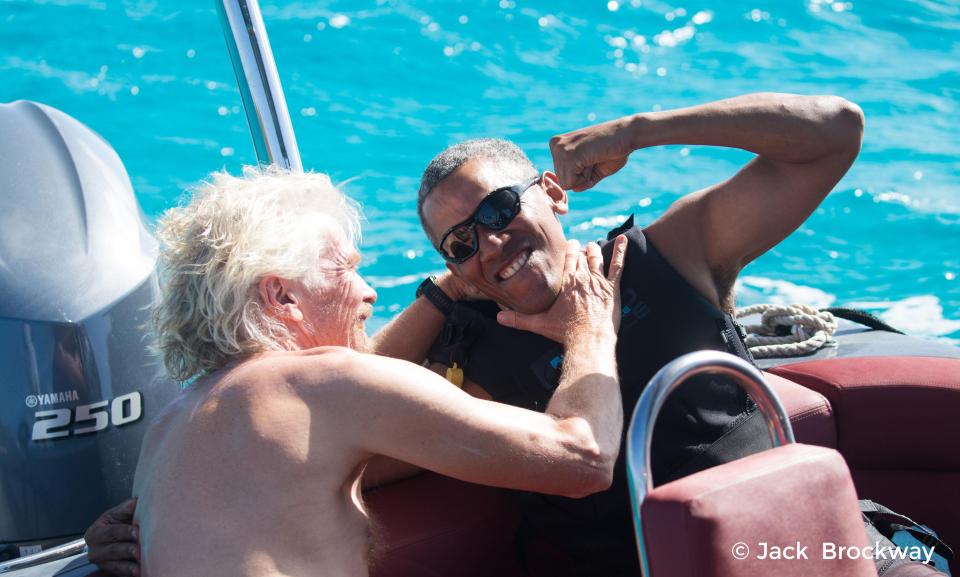  Former president Barack Obama was pictured wrestling on holiday with each pal Richard Branson