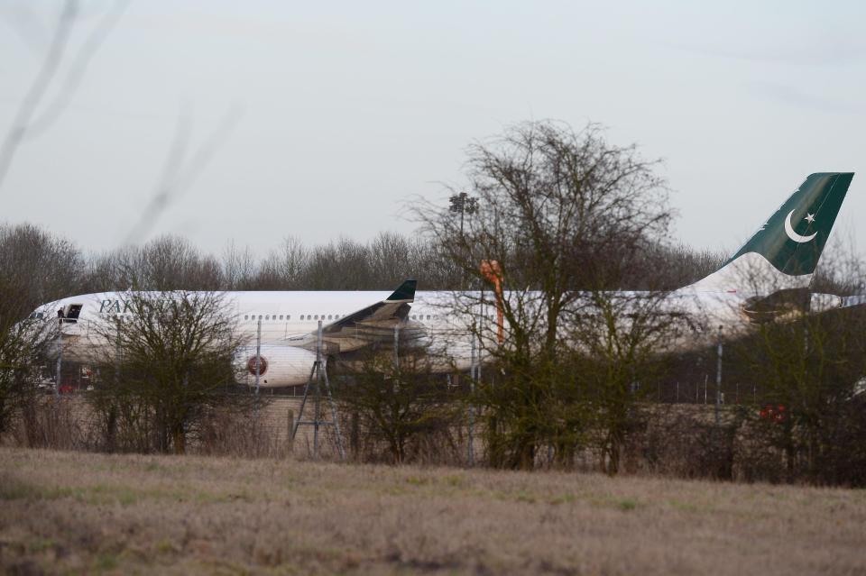 The plane was escorted by RAF fighter jets to land at Stansted and is being held away from the main terminal