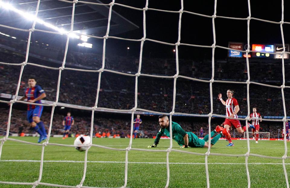  Suarez netted the opener for Barcelona after Moya parried Messi's strike