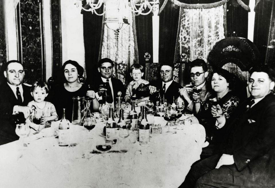  Chicago mobsters including Sam Genna sit enjoy dinner with their families