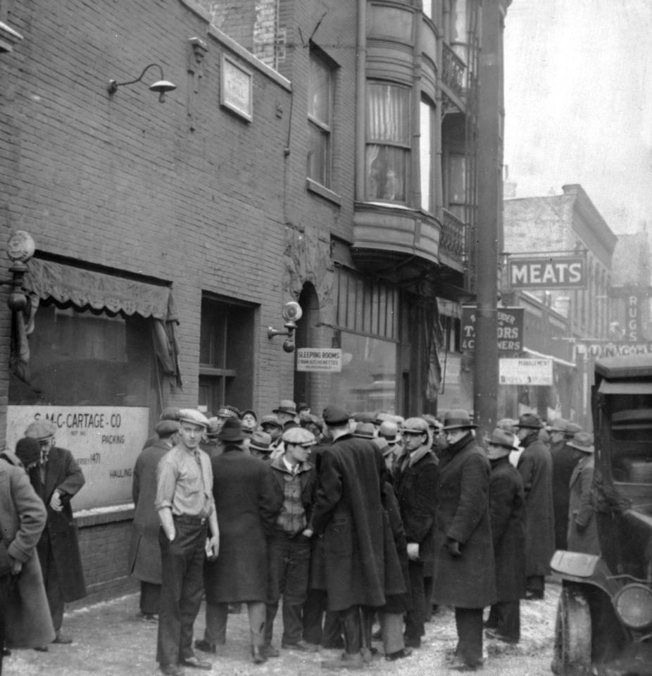  One of the most famous crimes of the era was the St Valentines Day Massacre. Pictured are people gathering outside the garage where the murders took place