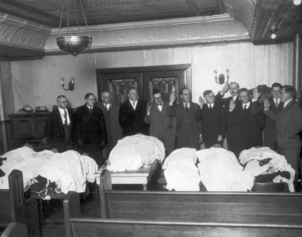  The bodies of those killed in the St Valentine's Day Massacre are put on display