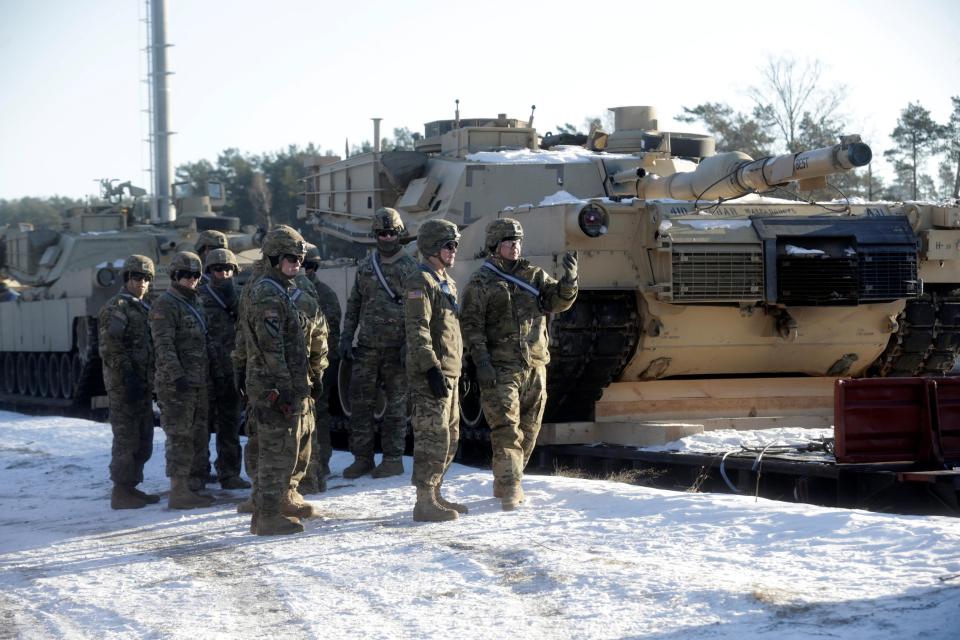  US soldiers organise the delivery of tanks to Lithuania where NATO exercises are taking place