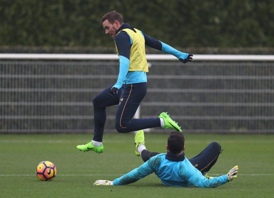  Vincent Janssen rides a tackle during the Spurs training session - he will be desperate to start hitting the net on a regular basis for the club