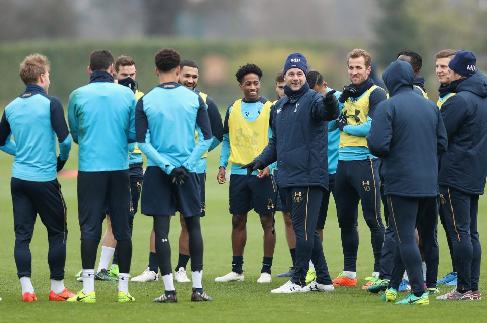  The smiles were even present when boss Mauricio Pochettino gathered the players around to talk some tactics